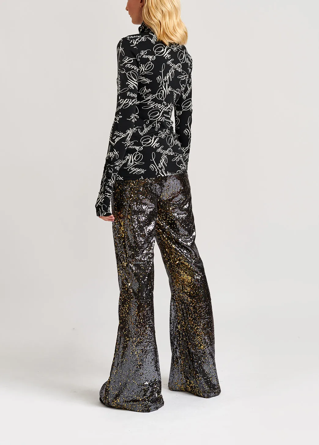Black turtleneck top with script-print