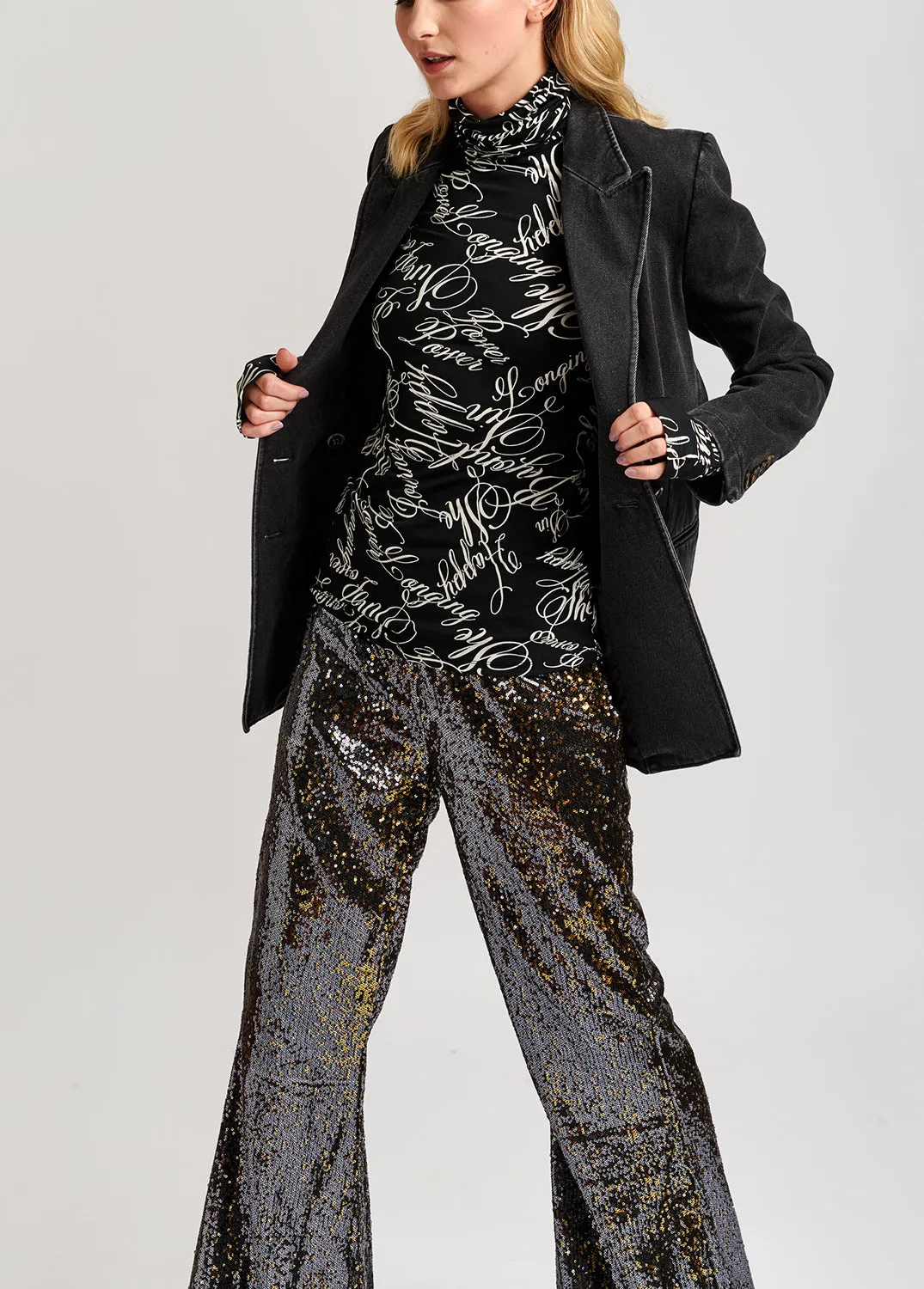 Black turtleneck top with script-print