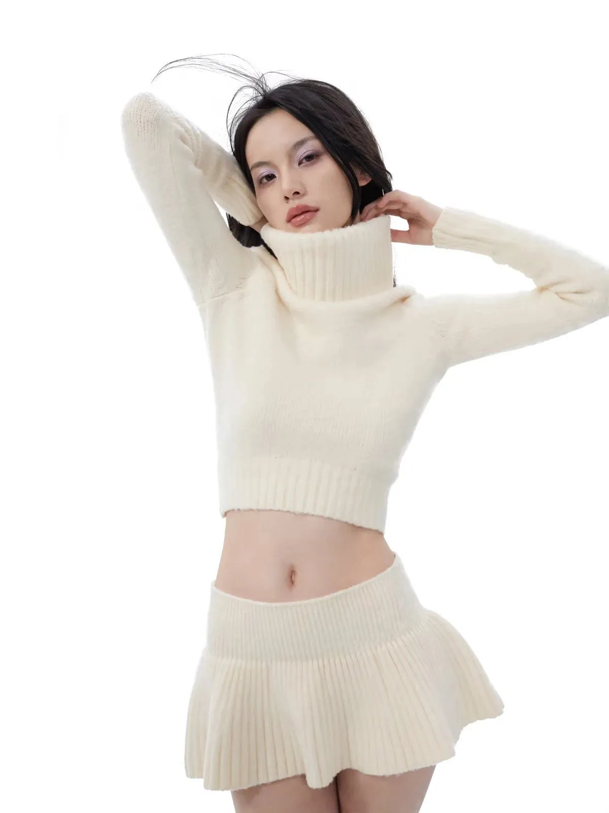 Turtleneck cropped flowing knit sweater with matching knit skirt set